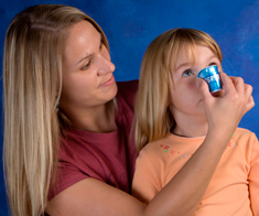 Mother using NoseBudd on Daughter picture